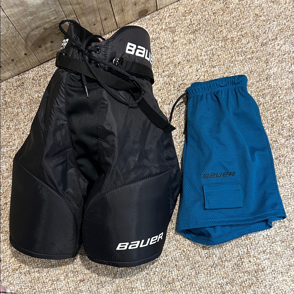 Bauer Kids Black and Blue Hockey Pants with Blue Garter